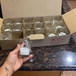 18 Votive Candles With Holders.