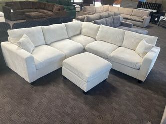 Cream comfy sectional w/ ottoman