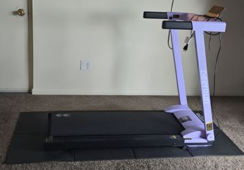 Deer run treadmill with noise cancellation mat and cup holder attachment