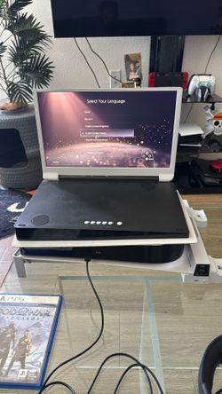 PlayStation 5 disk w/ G Story monitor