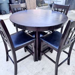 Brown bar height dining table