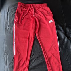 Red Adidas sweatpants (M)