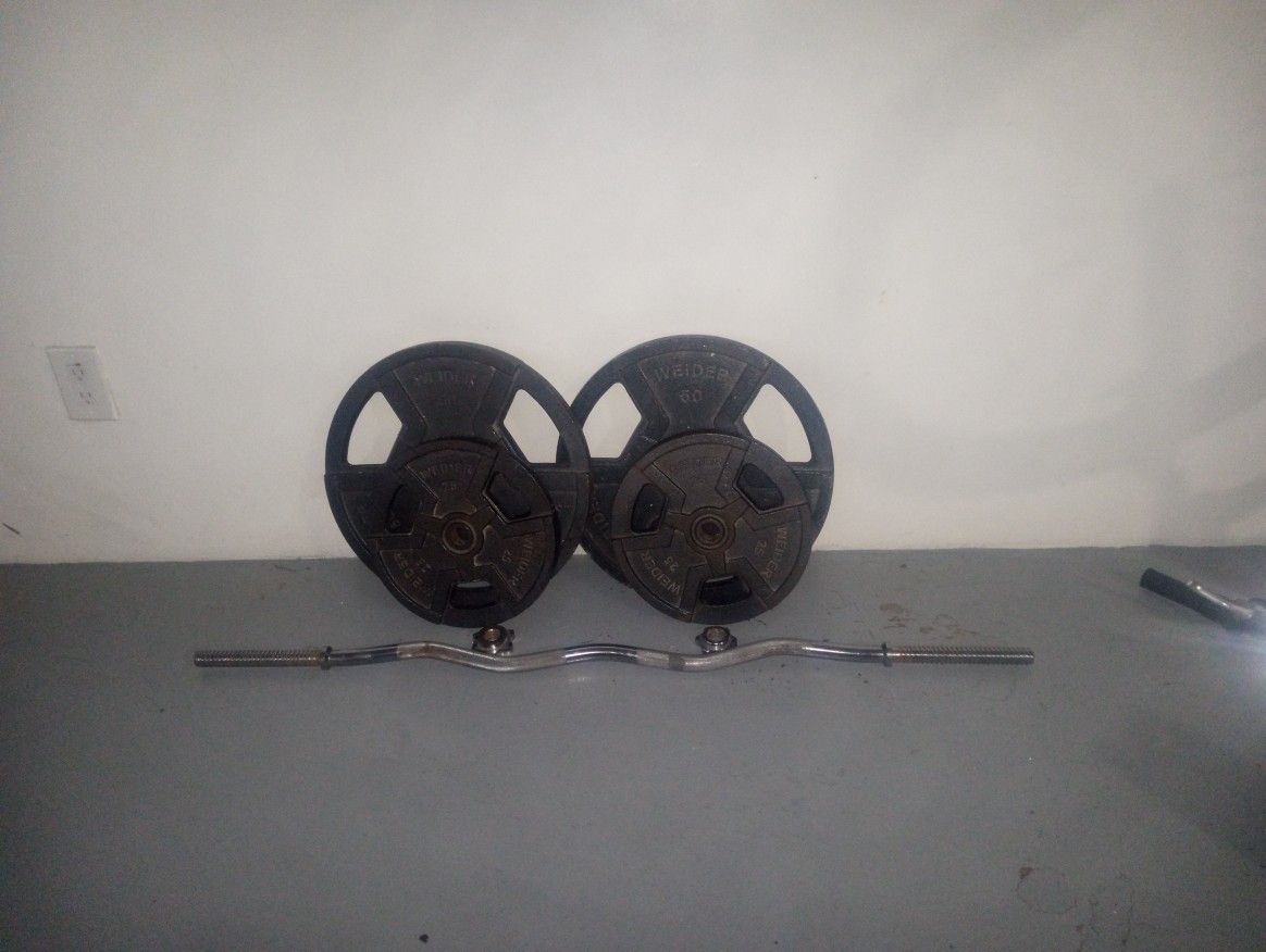 WEIDER Olympic weights (2) 50lbs &25lbs w/ Chrome curling bar.
