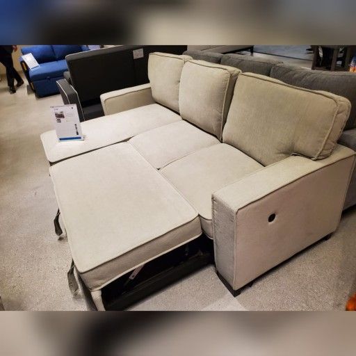 Beige Fabric Reversible Sleeper Sectional with Storage Chaise Drop-Down Table 2 Cup Holders and 2USB Ports