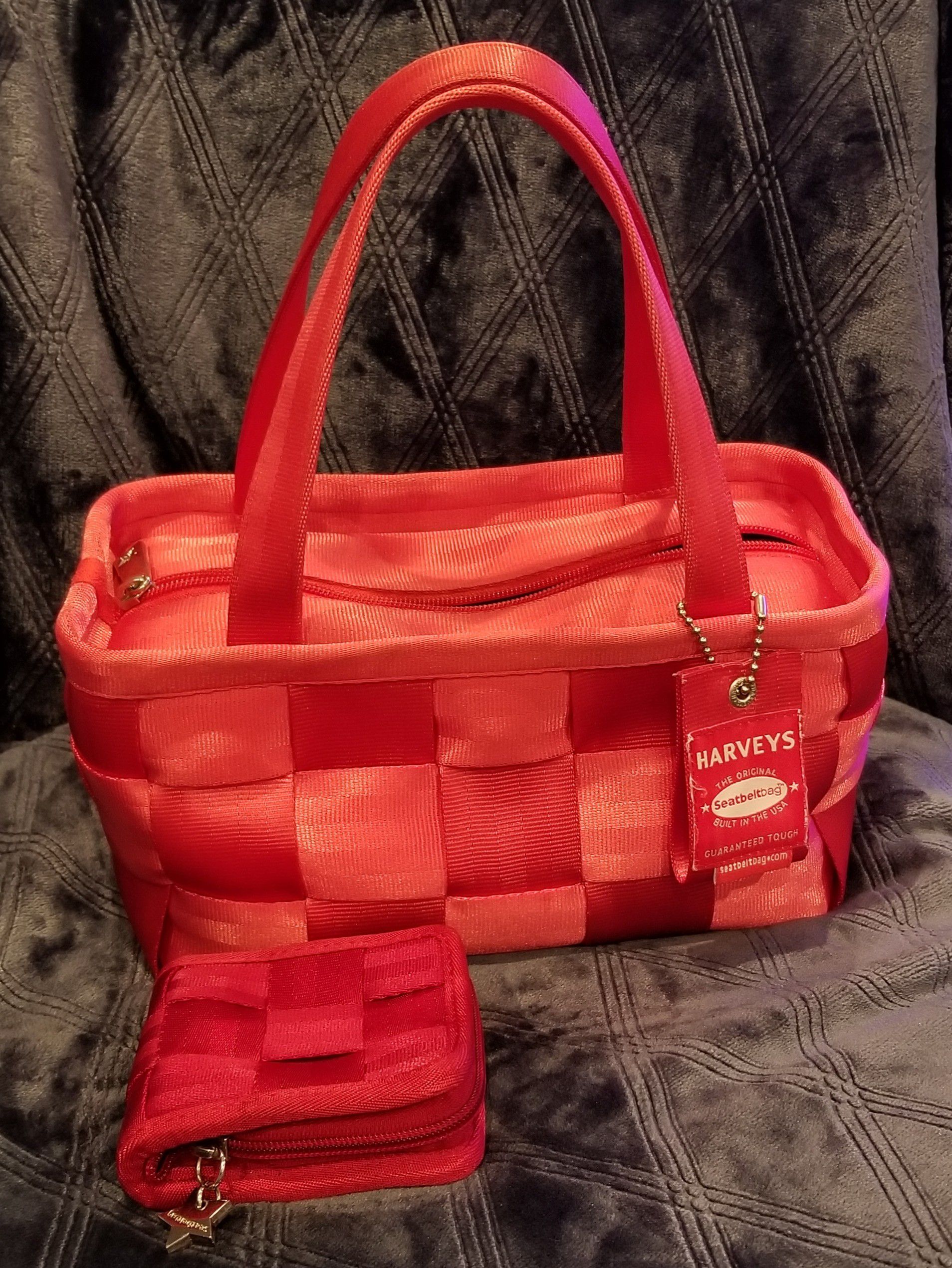 Red Harveys seatbelt purse and wallet