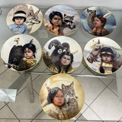 Vintage collectible porcelain plate set 1986