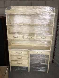 Vintage Bali hai Desk and book shelf, desk sells for $1,100.00 on Etsy.