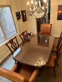 Large wood dining room table and chairs