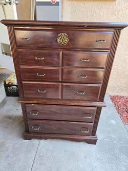 Dark brown wood tall dresser