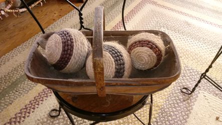 Antique basket with decorative balls