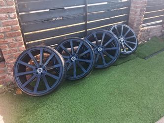 24 inch rims and tires. 5 lug. Good condition.
