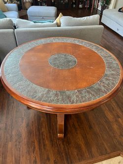 Round wooden nice coffee table- decorated