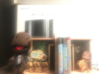 Little big planet 1,2,3 with ps3 and collectors edition bookshelf’s and sackboy doll