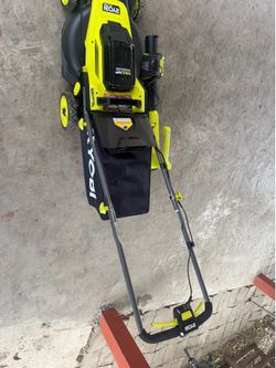 Lawnmower RYOBI charger and battery blower
