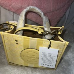 yellow coach purse 