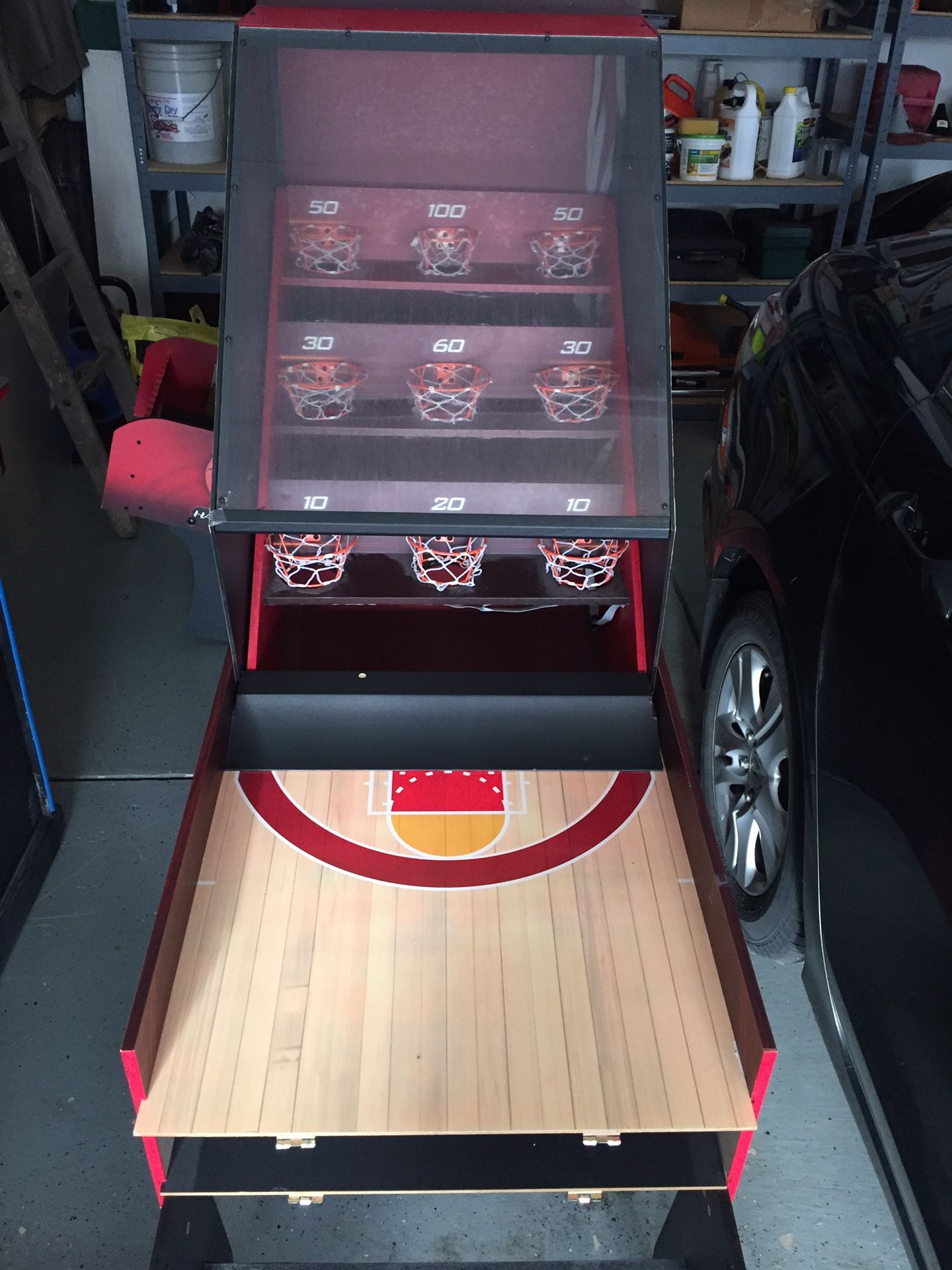 Basketball roll-a-score skee ball game