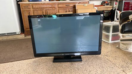 42” Panasonic TV      ( with Stand))
