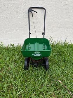 Turf Builder EdgeGuard Mini Push Broadcast Spreader