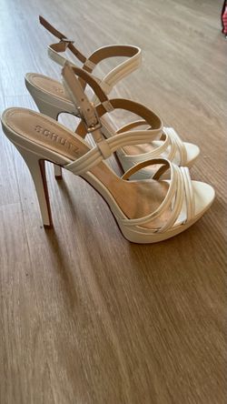 Shutz heals, white color, size 8.5, never been worn