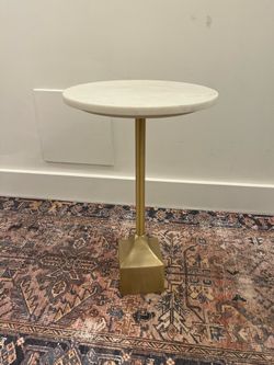 Two marble drink tables