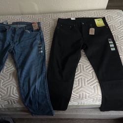 2 Levi’s Jeans 34 By 30 Brand New Good Condition. Black Levi 502 Taper/ Blue Levi 559 Relaxed Straight.