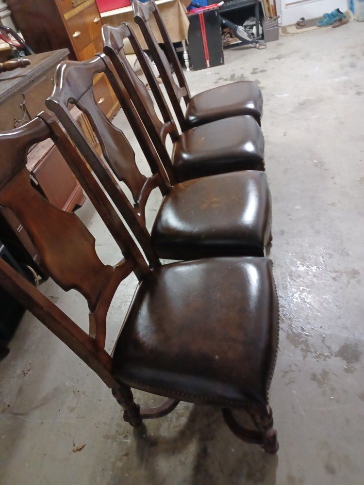 4 Haverty Leather Side Dining Chairs