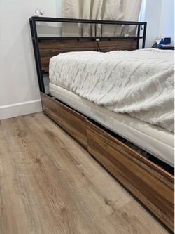 Queen size bed frame with box spring and mattress