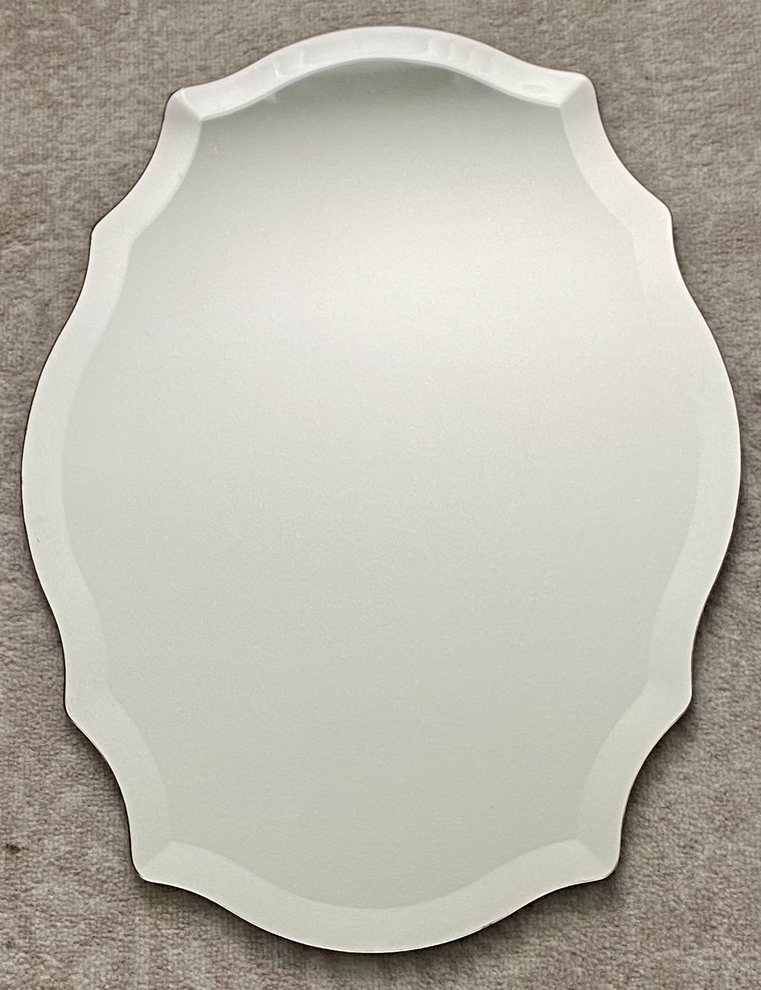 Beveled scalloped oval mirror