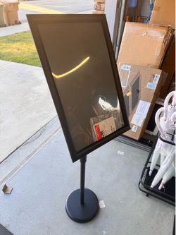 Brand Sign Holder - 11”x17” adjustable height. Magnetic frame. Brand new