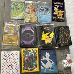 Lot of a bunch of pokemon card extras and accessories. Hundreds of etb sleeves and other stuff 