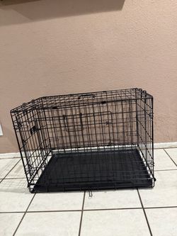 DOUBLE DOOR BLACK  WIRED CRATE FOR DOGS IN GREAT CONDITION ( H 21” x L30” x W 19”)