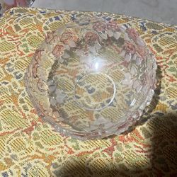vintage crystal bowl, likely the Mikasa Carmen pattern, featuring embossed flowers and frosted leaves, which was manufactured 