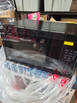 GE
0.9 cu. ft. 900-Watt Countertop Microwave in Black