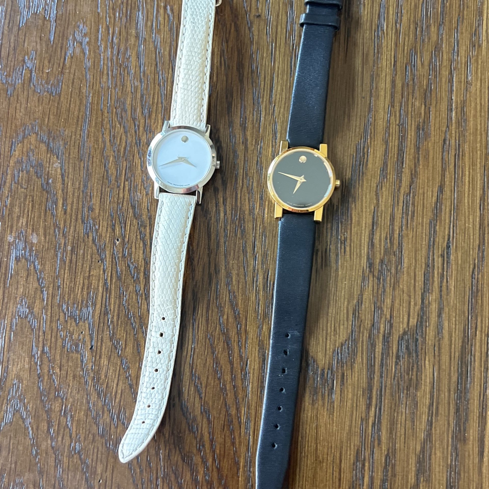 white and black Movado women’s watch