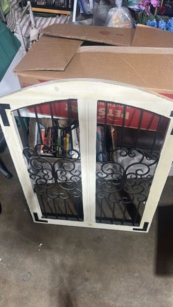 Arched Wood Cabinet with Wrought Iron Doors