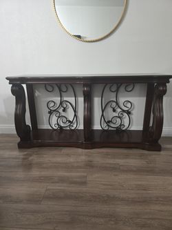 Dark Wood Console Table with Iron Scrollwork