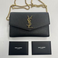 YSL BLACK ENVELOPE WALLET WITH GOLD EMBLEM AND CHAIN, IN GREAT CONDITION, ENTRUPY VERIFIED