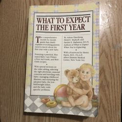 What to Expect the First Year book. The cover has some curled edges but all the pages inside are completely fine