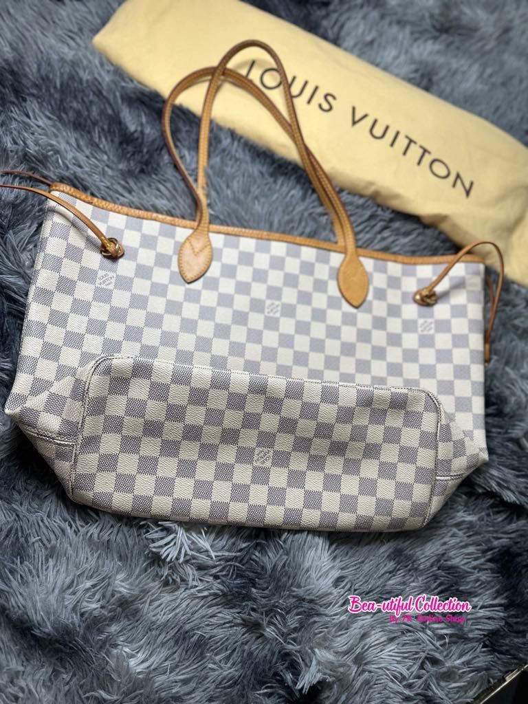 Louis Vuitton Never full MM Used
