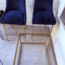 Blue Velvet upholstered stool chairs & Glass Gold coffee table