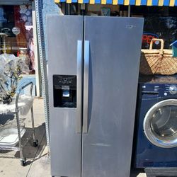 Whirlpool Side-by-Side Refrigerator. 