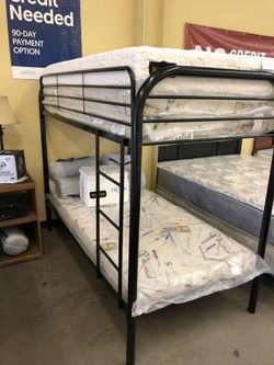 Bunk bed with mattresses
