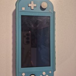 Switch lite with case,  charger, & micro SD card