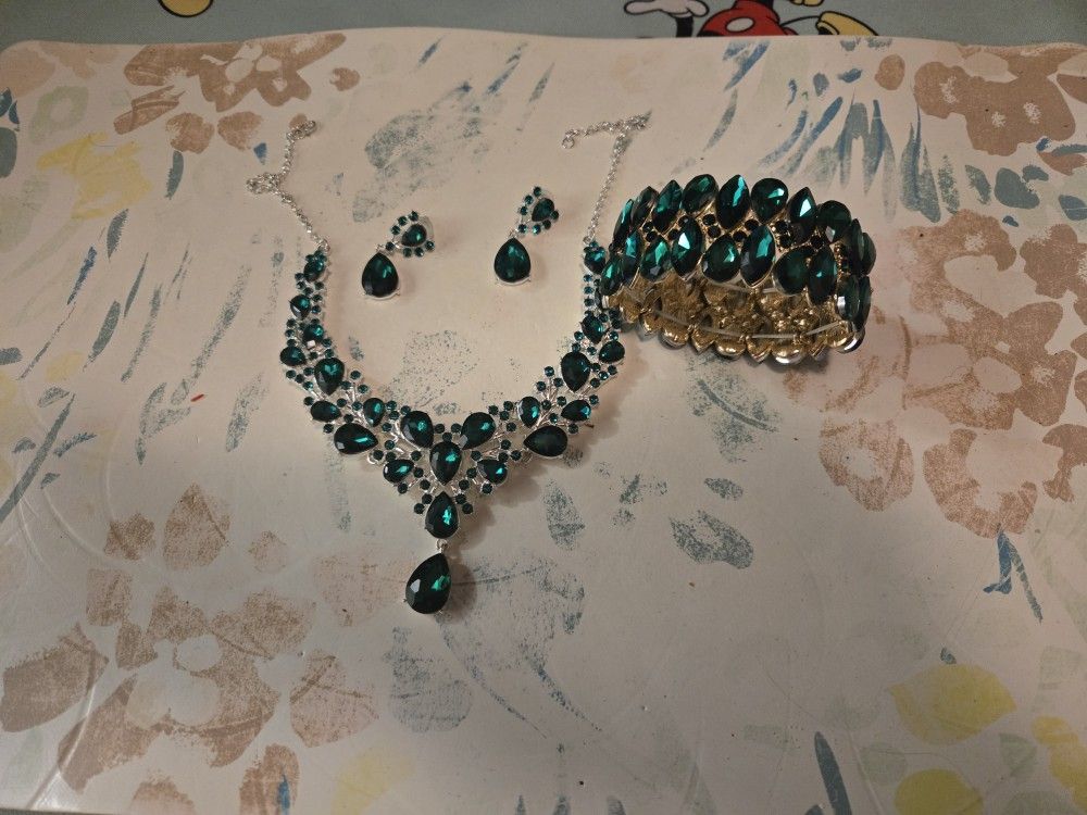 Necklace, earrings, and bracelet