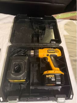Dewalt  drill with battery and various drill bits