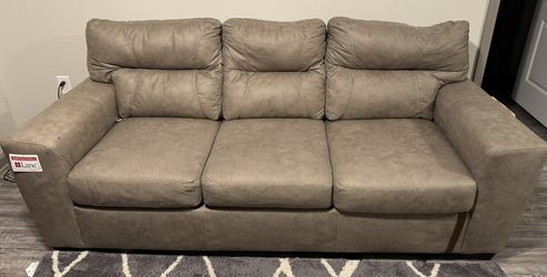 Tan Loveseat