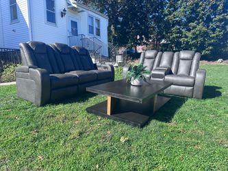 Gray Leather Reclining Sofa and Loveseat Set