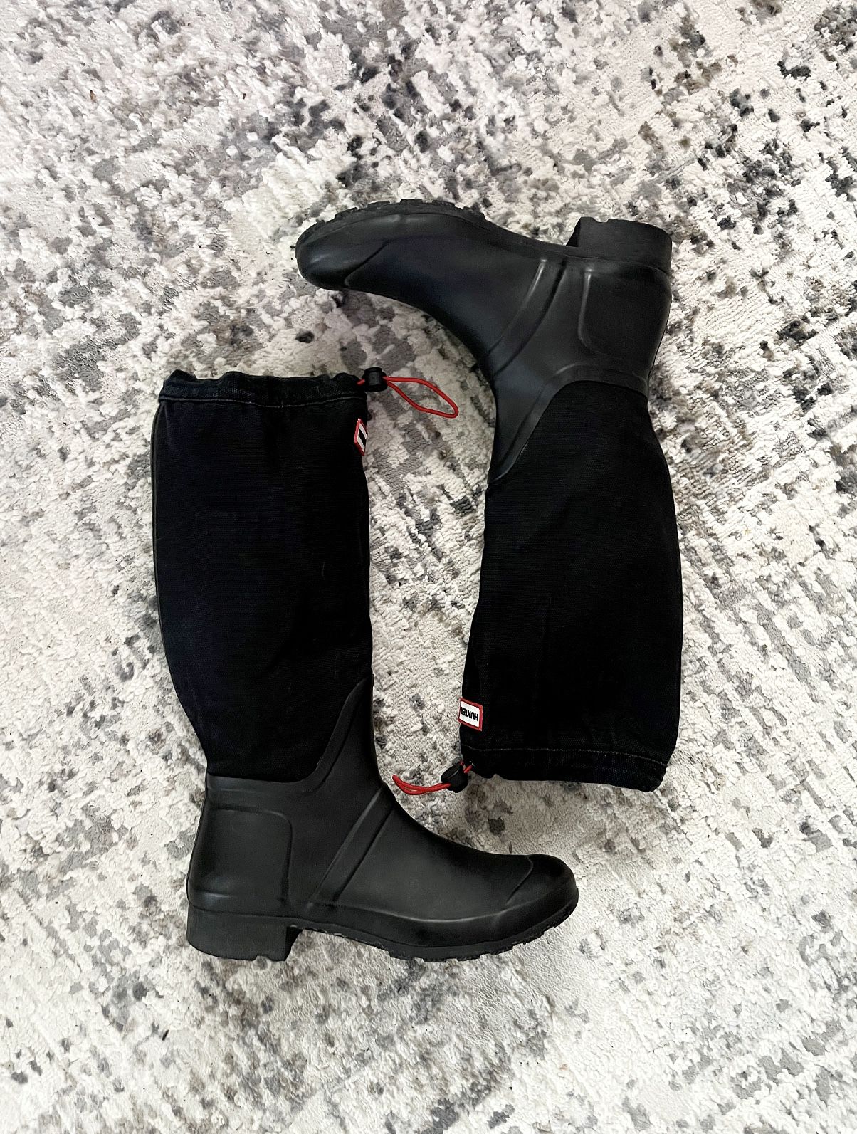 Women’s Hunter black denim / rubber rain or snow boots. Size 10 Retail $190 Good condition! With draw string closures. 