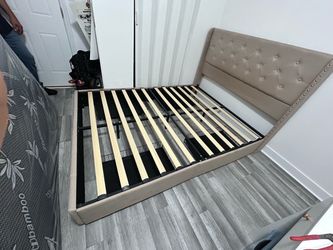 Bed, mattress, and nightstand