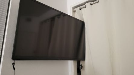 60" Sharp LED TV (Optional Wall Mount Included) – $125